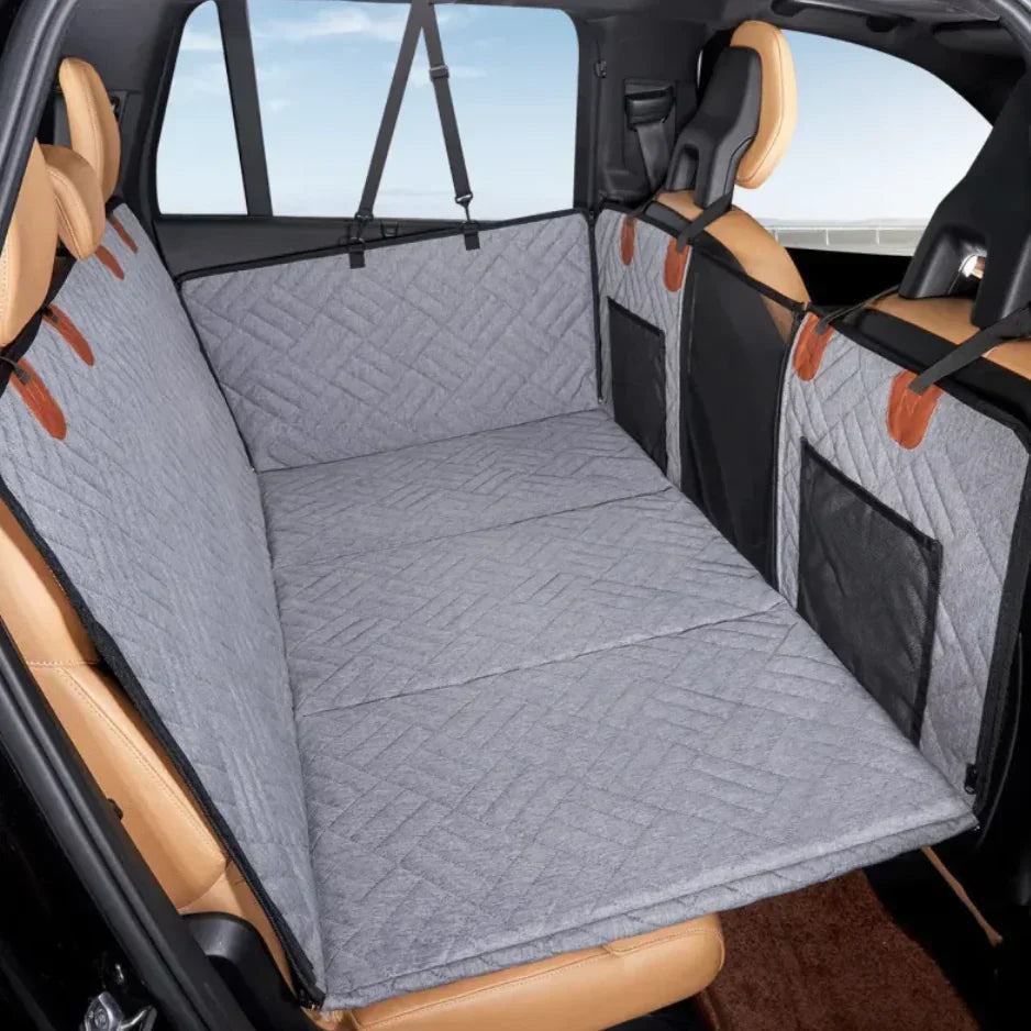Quilted pet car seat cover protects backseat, ideal for pets, easy-clean, non-slip design